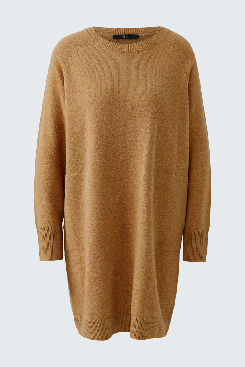 Casual knit dress: Simple brown knit dress with long sleeves, perfect for a relaxed look.