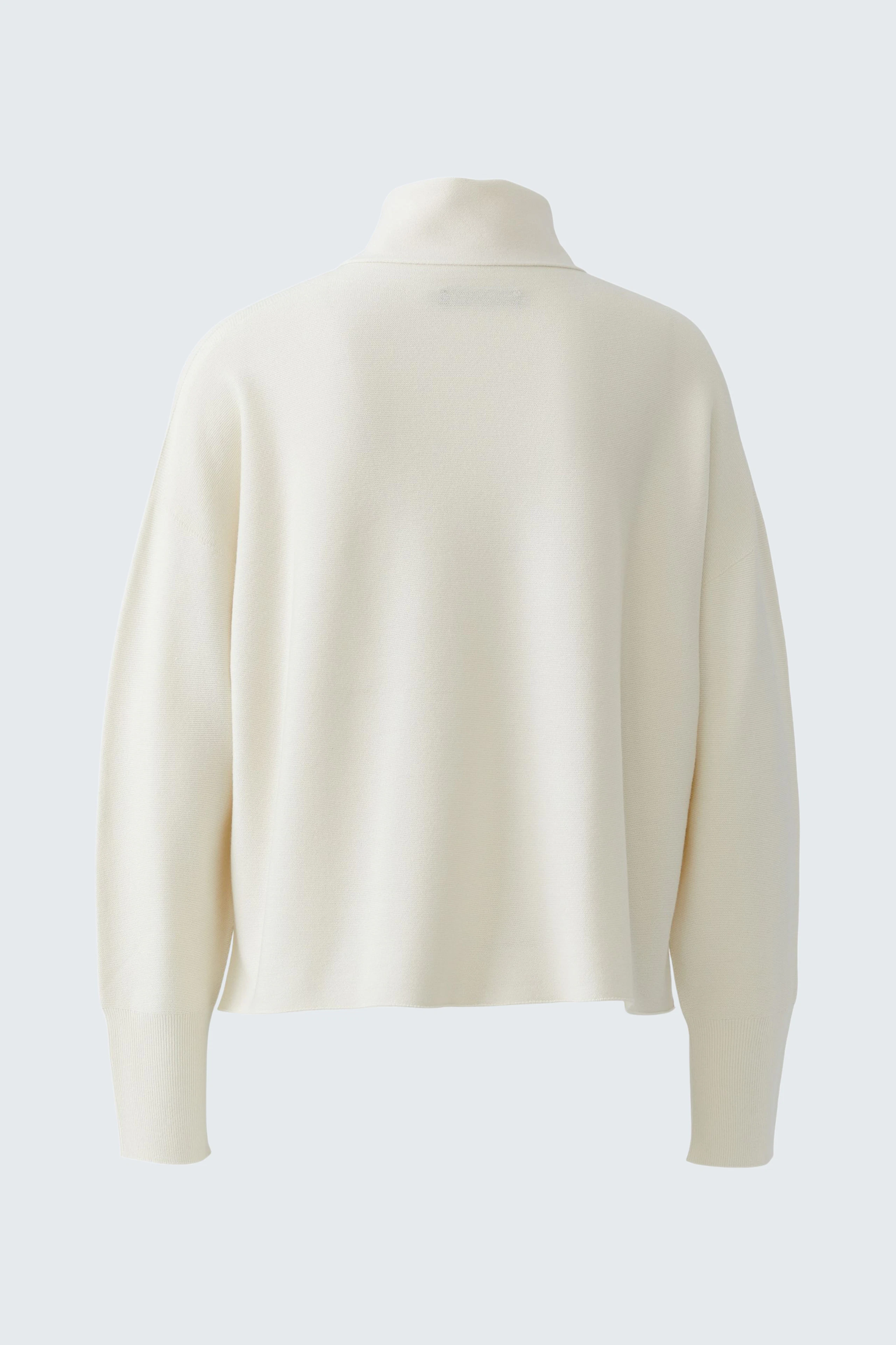 Casual women's pullover: Cream-colored pullover with a relaxed fit and high collar, no model shown.