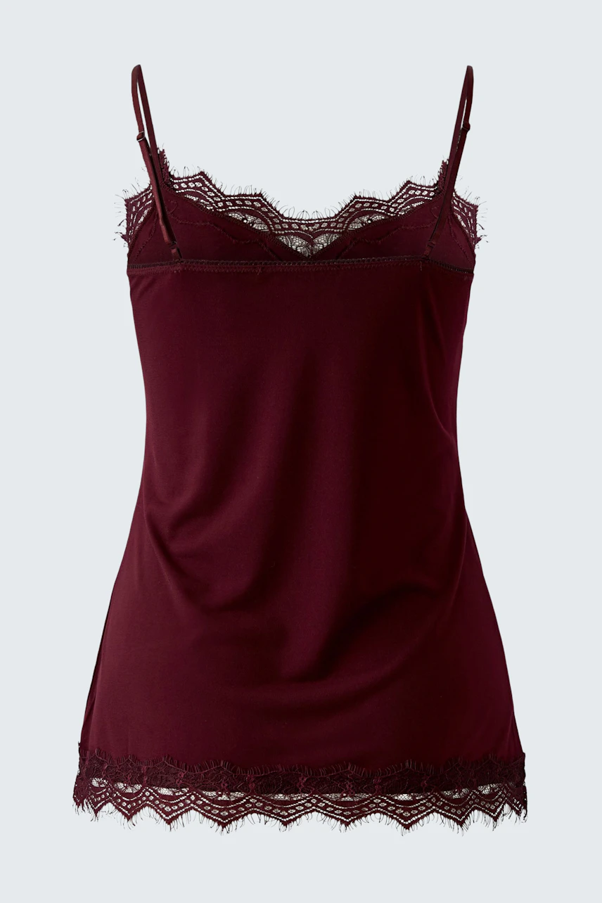 Burgundy lace-trimmed top: Sleeveless design with delicate lace details, perfect for layering or wearing alone.