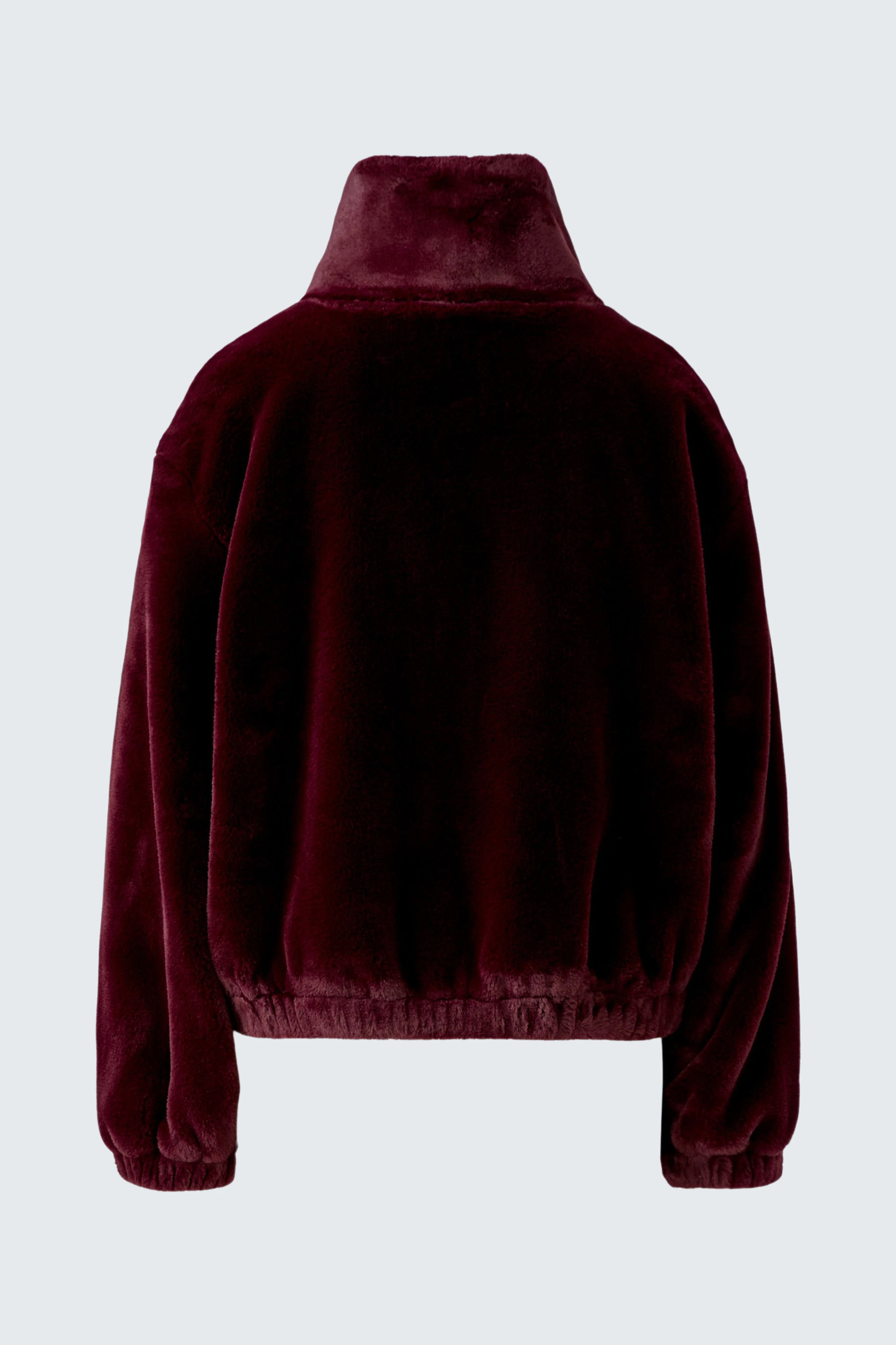 Plush burgundy blouson: Soft, cozy texture with elastic cuffs and hem, perfect for casual wear.