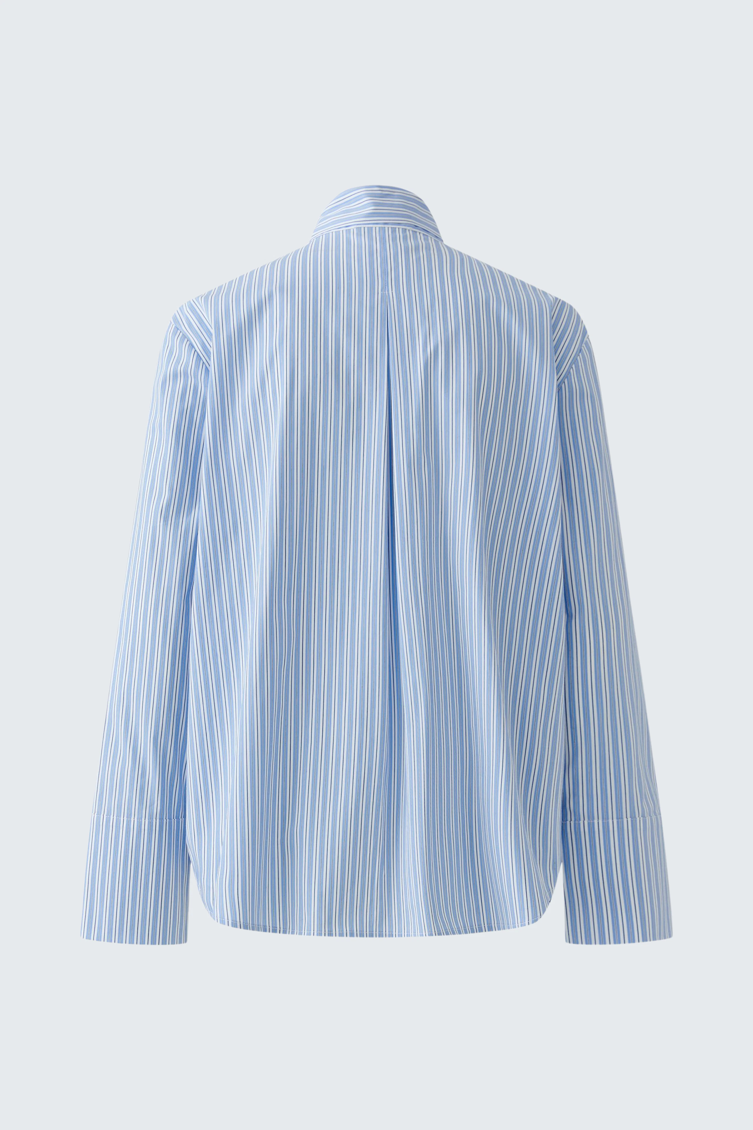 Striped pussy-bow blouse in light blue, shown from the back, highlighting its relaxed fit and classic design.