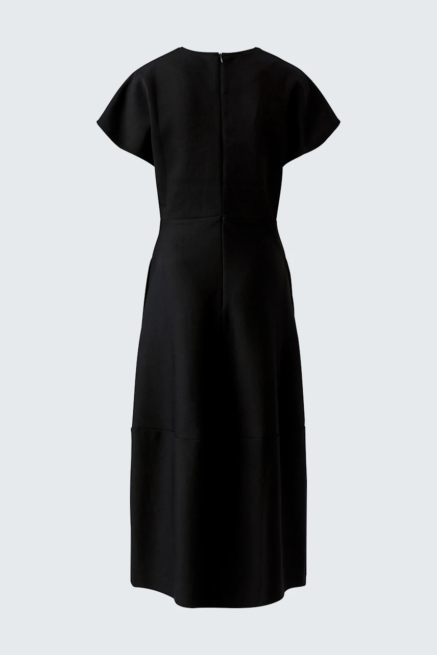 Black dress with short sleeves, back view. Simple and versatile design for everyday wear.