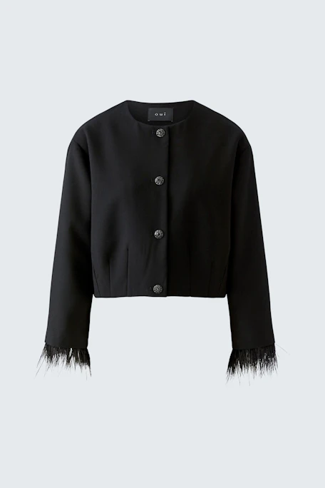 Schwarze Damen-Jacke: Kurze Jacke mit Knöpfen und Fransen an den Ärmeln, schlicht und vielseitig kombinierbar.