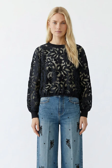 Black lace pullover with floral pattern, showcasing a casual and stylish design.