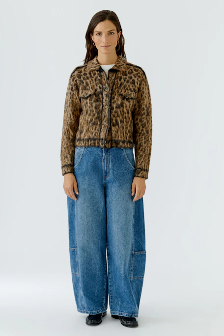Leopard print cardigan: A bold, patterned knitwear piece without a model, showcasing its unique design.