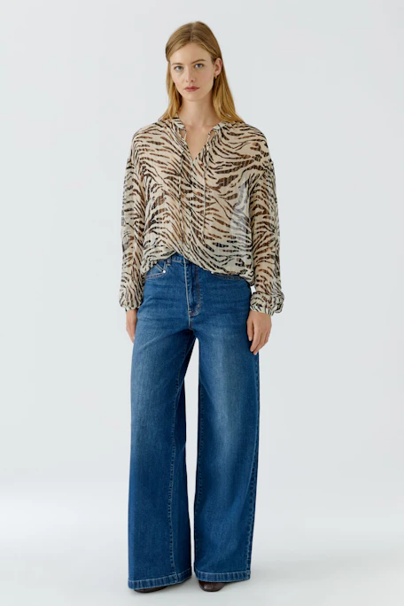 Luftige Damen-Bluse mit Zebra-Muster, ideal für einen lässigen Look. Perfekt für den Alltag.