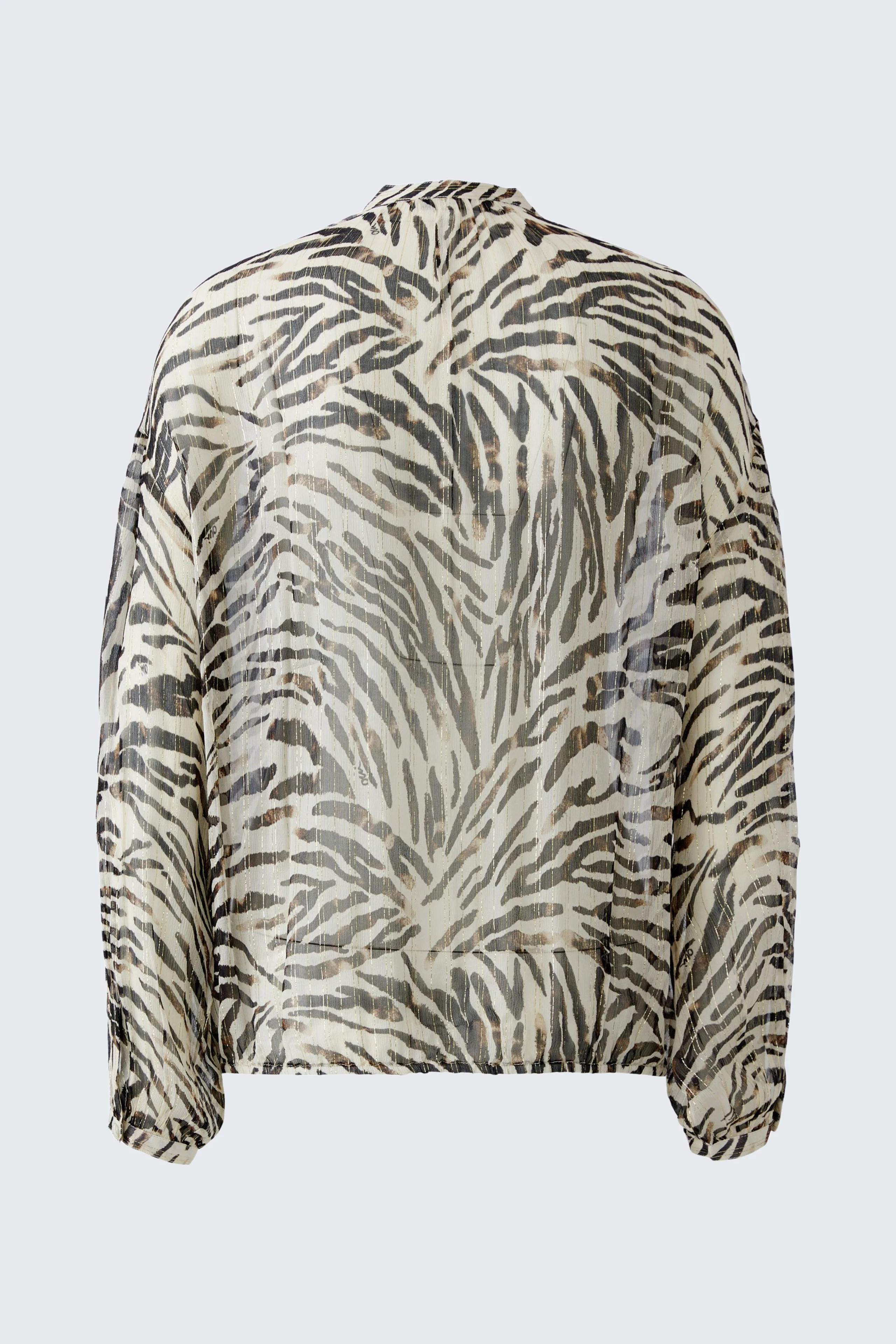 Lässige Damen-Bluse mit Zebra-Muster in Schwarz-Weiß, ideal für einen modischen Auftritt.